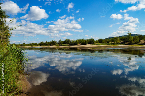 Samara  region  river  Volga  mountains  ditches  water  reflection  shore  blue  sky  white  clouds  shore  sand  forest  trees  nature  walk
