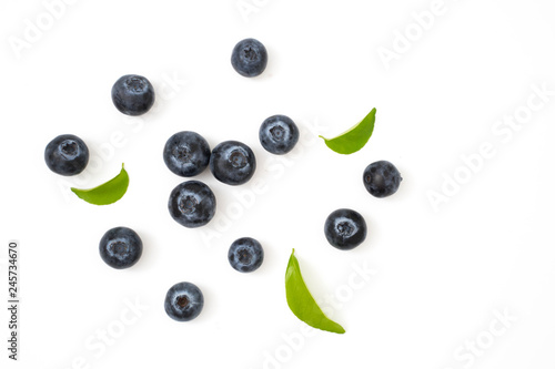 Group blueberries and leaf isolated on white