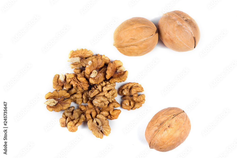 Walnuts and kernels isolated on white background