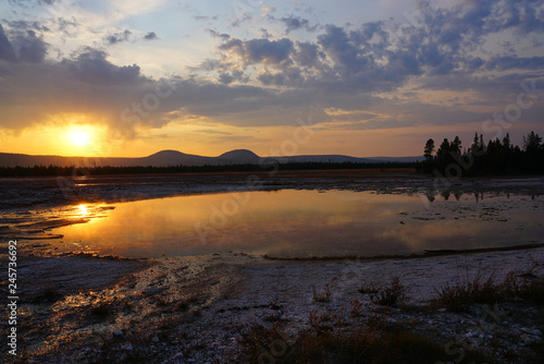 Sunset fumes over the Grand Prismatic pool in Yellowstone National Park  United States