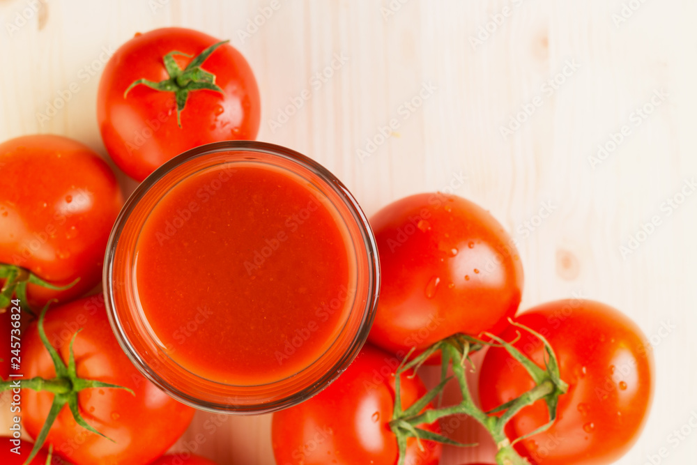 Glass of tomato juice with tomatoes Glass of tomato juice with tomatoes