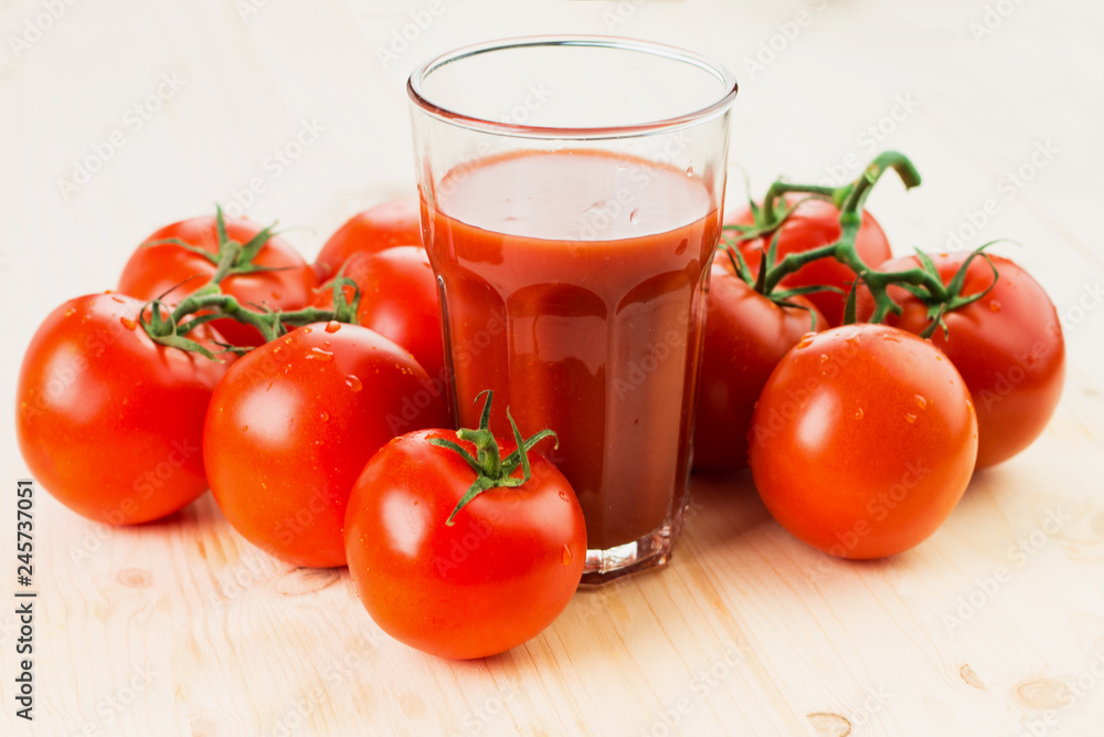Glass of tomato juice with tomatoes Glass of tomato juice with tomatoes