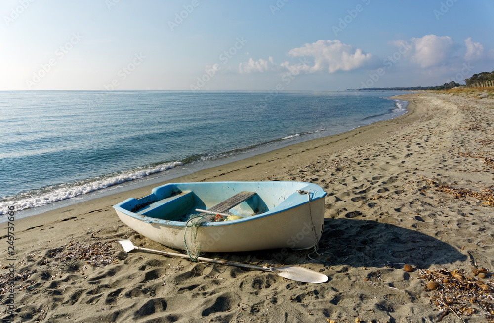 beach and small boat in the eastern coast of Corsica beach and small boat in the eastern coast of Corsica