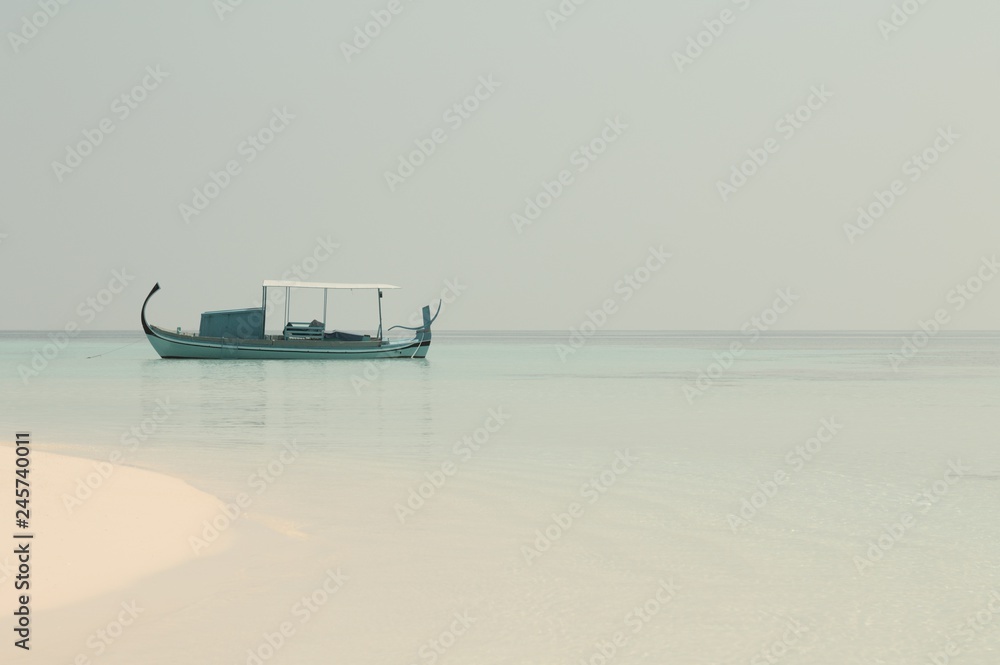 Fototapeta premium Isolated traditional maldivian boat called 