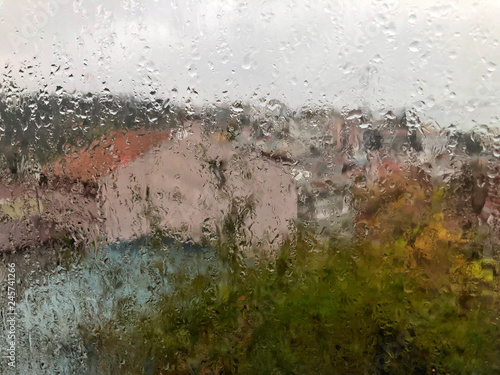 background with rain drops on window like a painting