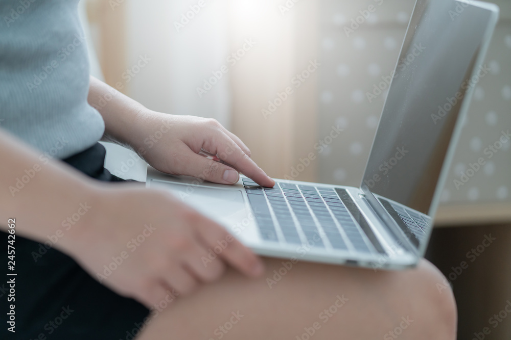 Fototapeta premium close up hand beautiful asian woman enjoy happiness working at home successful positive thinking white bedroom background
