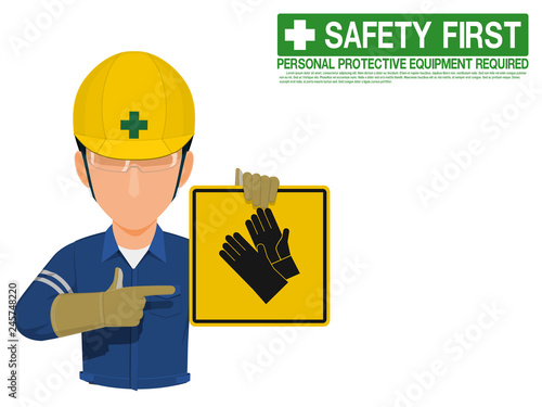Industrial worker is presenting gloves sign