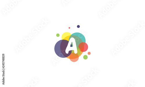 Bright and colorful image of the letter A, against the background of multicolored circles.