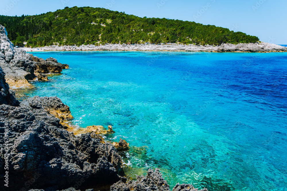Dafnoudi beach in Kefalonia, Greece. Clear ripple water Stunning amazing charming places, famous beaches. Vacation recreation concept Dafnoudi beach in Kefalonia, Greece. Clear ripple water Stunning amazing charming places, famous beaches. Vacation recreation concept