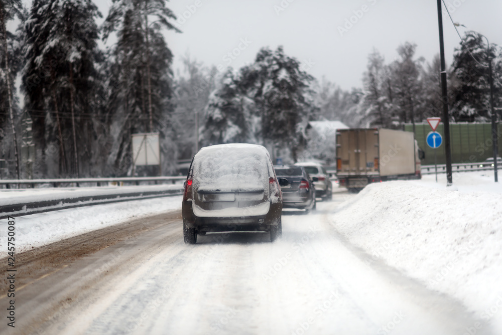 Blizzard on the road. Heavy snowfall paralyzed traffic for several hours. Blizzard on the road. Heavy snowfall paralyzed traffic for several hours.