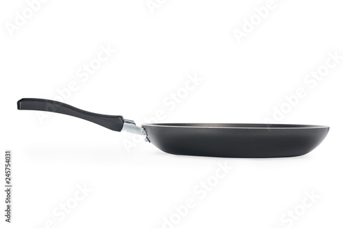 Black frying pan isolated on white with clipping path photo