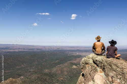 jung women and men sitting on St Mary's Peak from the Flinders Ranges National Park photo