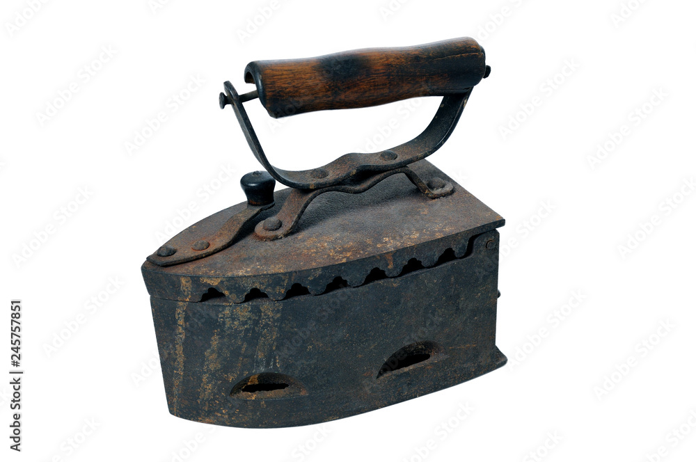 Antique coal iron. Old rusty iron isolated on white background Antique coal iron. Old rusty iron isolated on white background