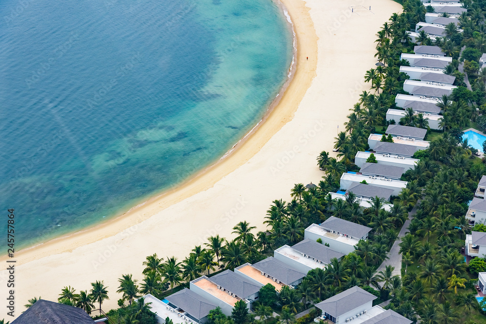 bungalow resort in a row on the beach