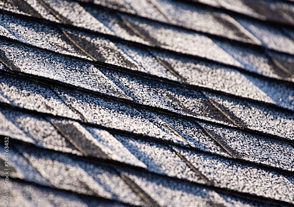 Frost on a newly shingled roof creating an interesting pattern.
