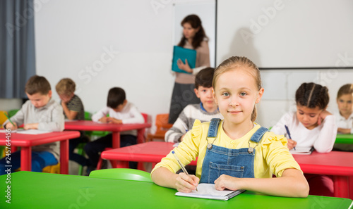 Girl studying in classroom