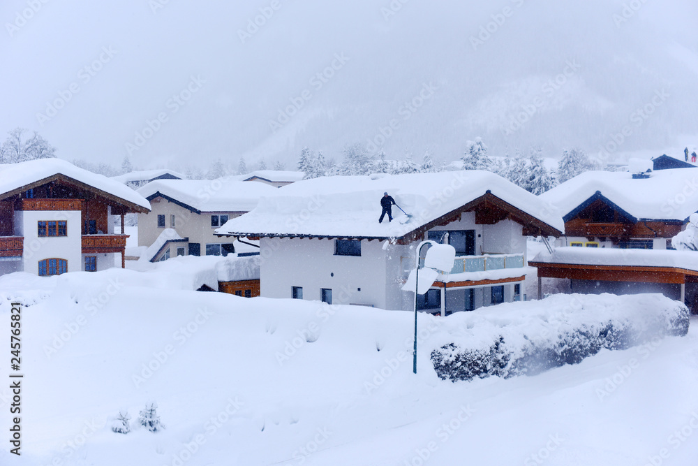 The winter ski chalet and cabin in snow mountain landscape in Austria, Europe. The winter ski chalet and cabin in snow mountain landscape in Austria, Europe.