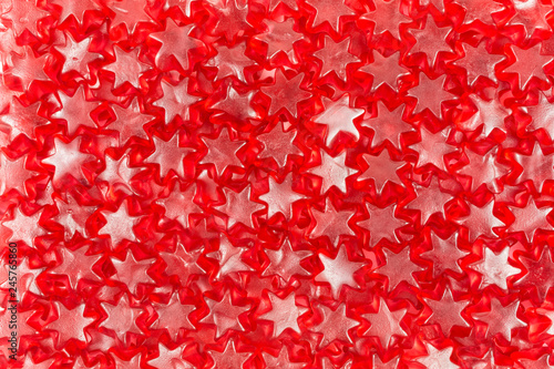 background of star shaped gummy candy with mulled wine flavor