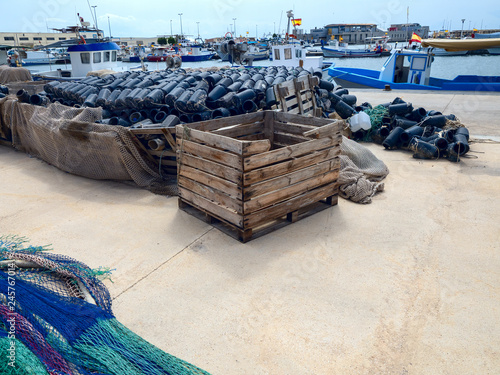 Fishing nets and boats in the port in the mediterranean sea © vitakot