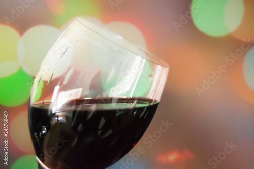 wine cup with colored lights in the background
