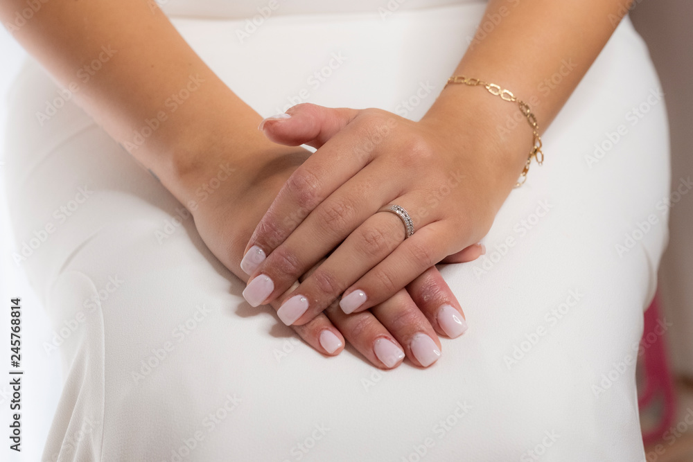 woman's hands with engagement ring for wedding celebration woman's hands with engagement ring for wedding celebration