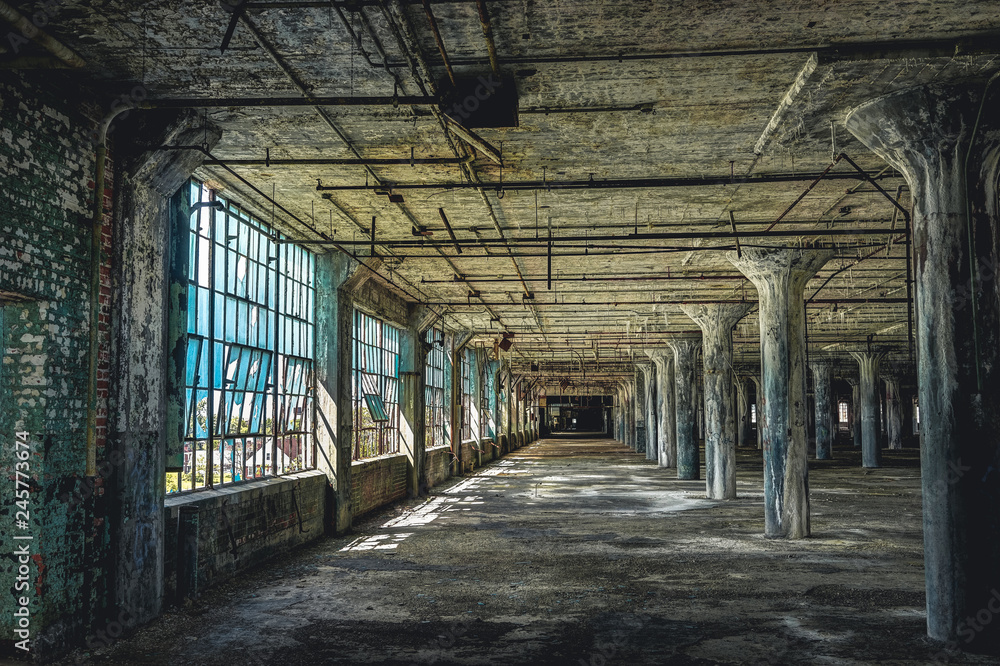 Interior view of the abandoned Fisher Body Plant factory in Detroit. The plant is abandoned and vacant ever since.