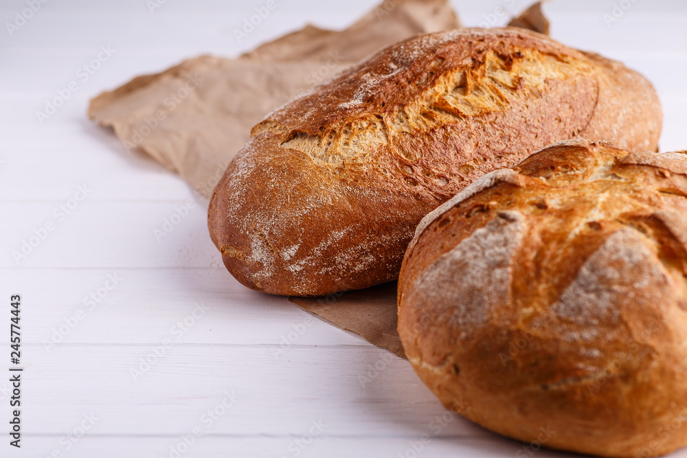 Freshly Baked Homemade Bread, close-up, isolated on a white background. Freshly Baked Homemade Bread, close-up, isolated on a white background.