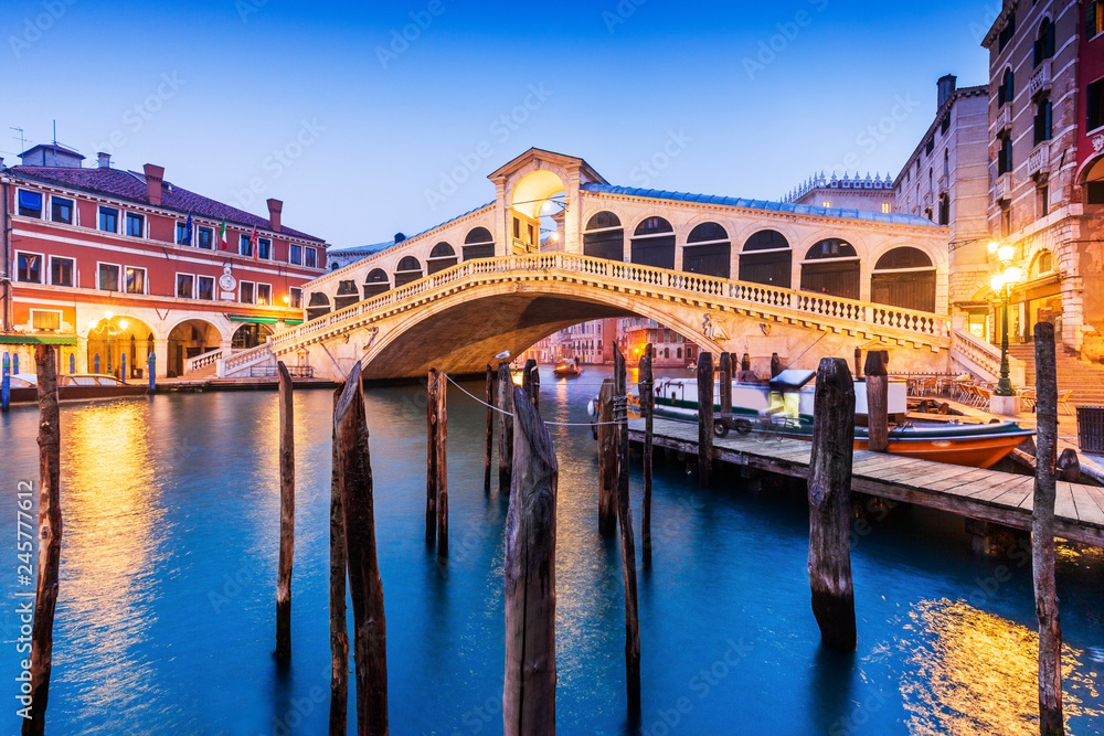 Venice, Italy. Rialto bridge and Grand Canal at twilight.