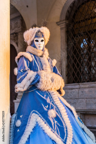 Venice, Italy. Carnival of Venice, beautiful mask at St. Mark's Square.