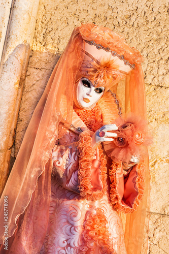 Fototapeta Naklejka Na Ścianę i Meble -  Venice, Italy. Carnival of Venice, beautiful mask at St. Mark's Square.