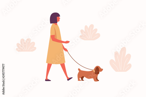 A young girl walks with her dog. Image on the topic of pet care. Vector illustration.