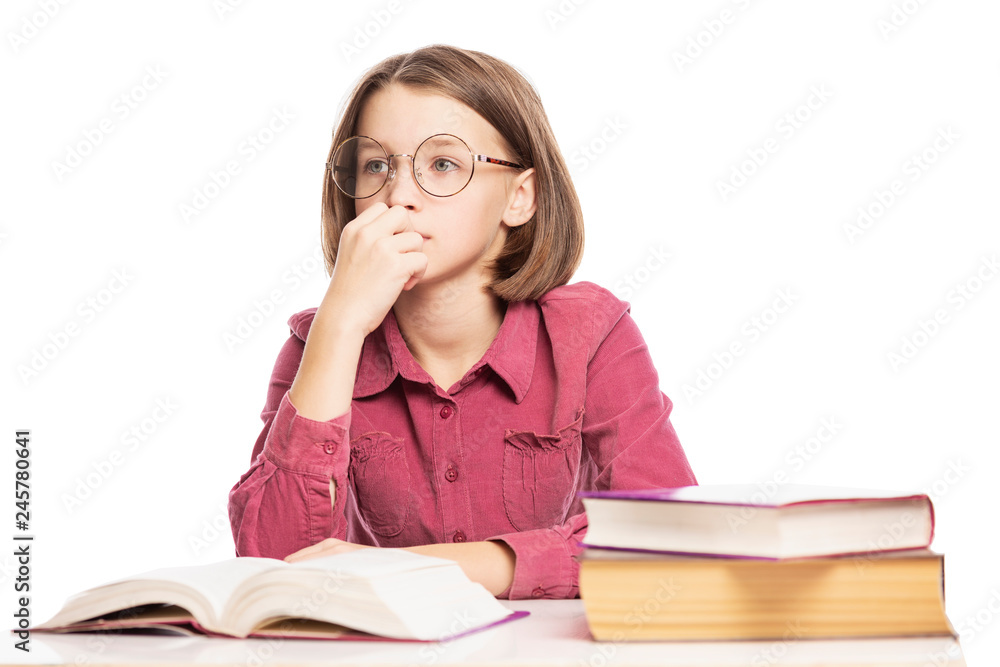 Teen girl with glasses teaches lessons, isolated on white background Teen girl with glasses teaches lessons, isolated on white background