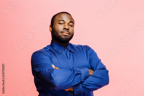 Photography Portrait of a man in a blue shirt with his arms crossed