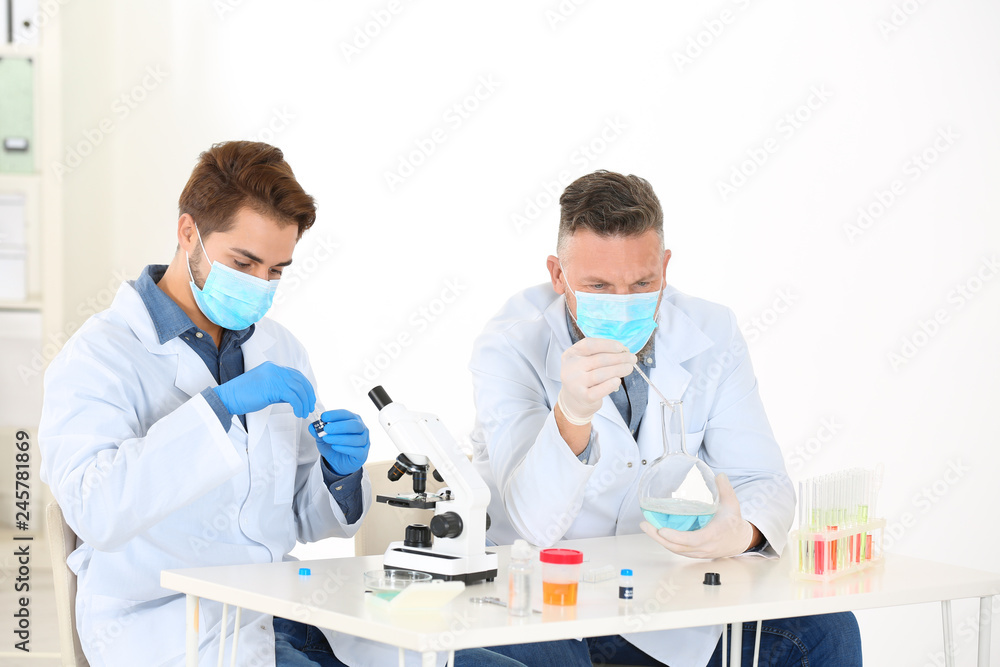 Scientists working in laboratory. Research and analysis Scientists working in laboratory. Research and analysis