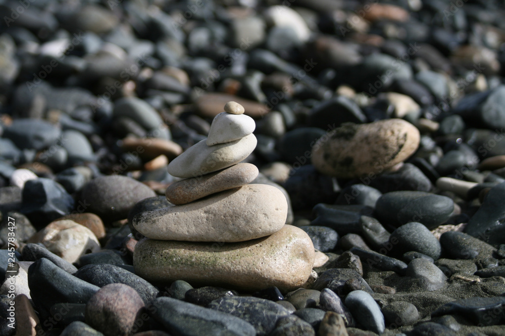 Pebble pyramid on a beach