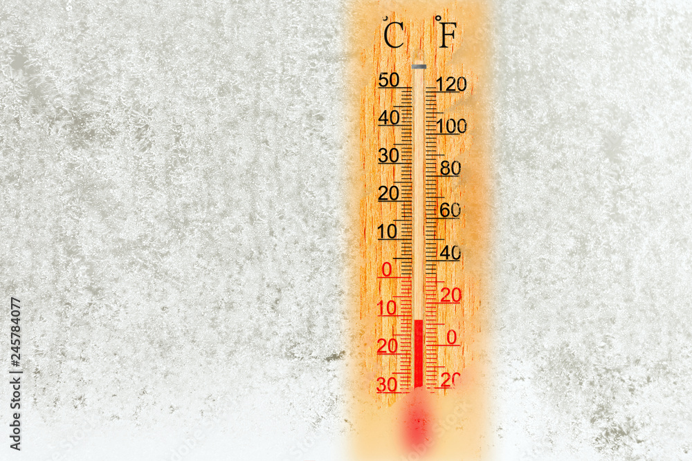 Outdoor thermometer on a frosty window. Temperature minus 11 degrees celsius  Stock Photo | Adobe Stock