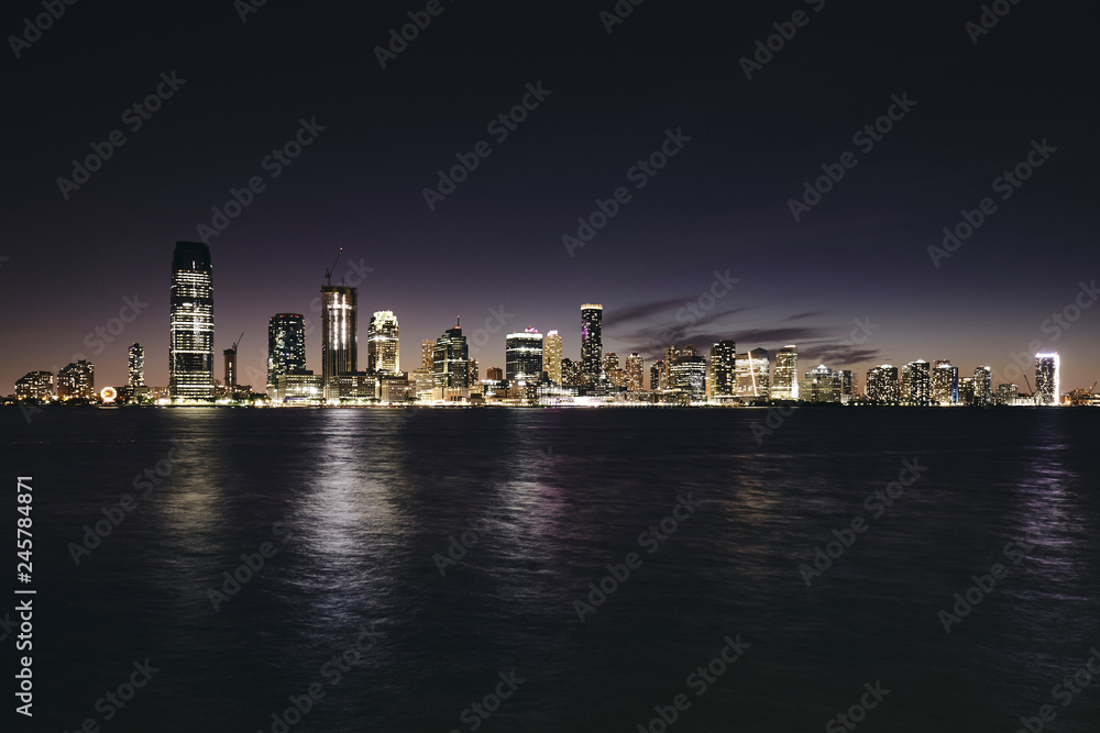 New Jersey panorama at night, color toning applied, USA.