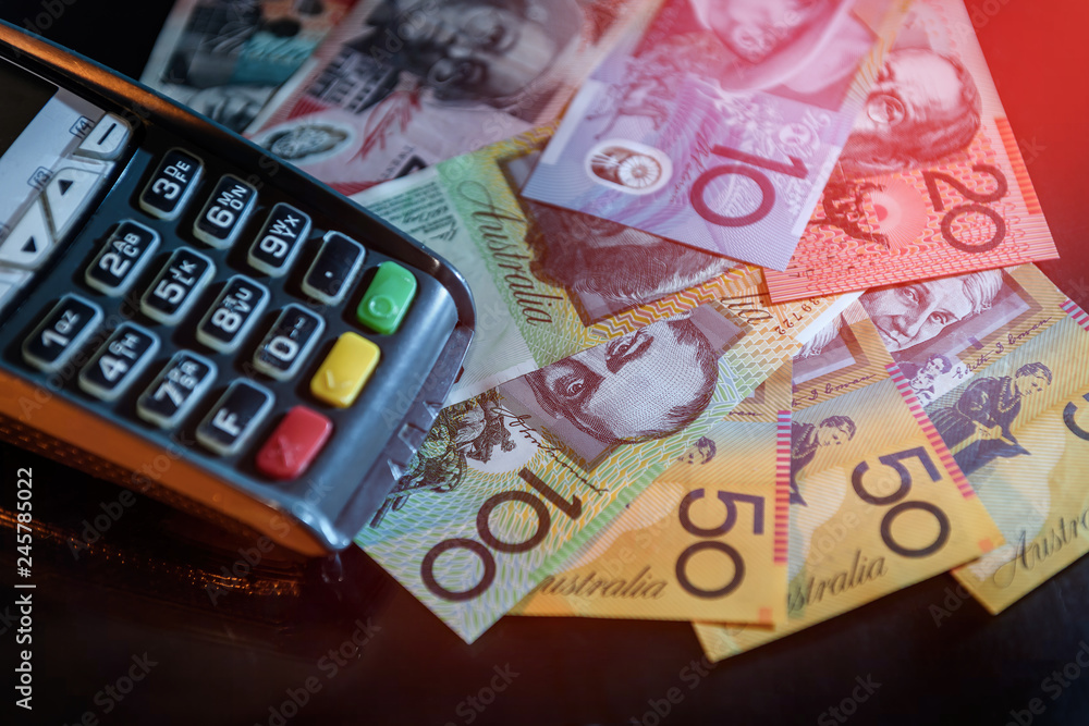 Australian dollar banknotes with terminal at black Australian dollar banknotes with terminal at black
