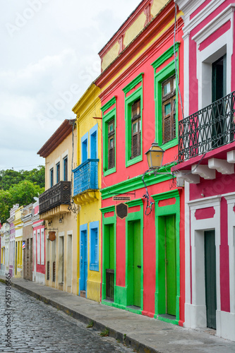The historic architecture of Olinda in Pernambuco, Brazil with its colonial buildings and cobblestone streets at sunset.