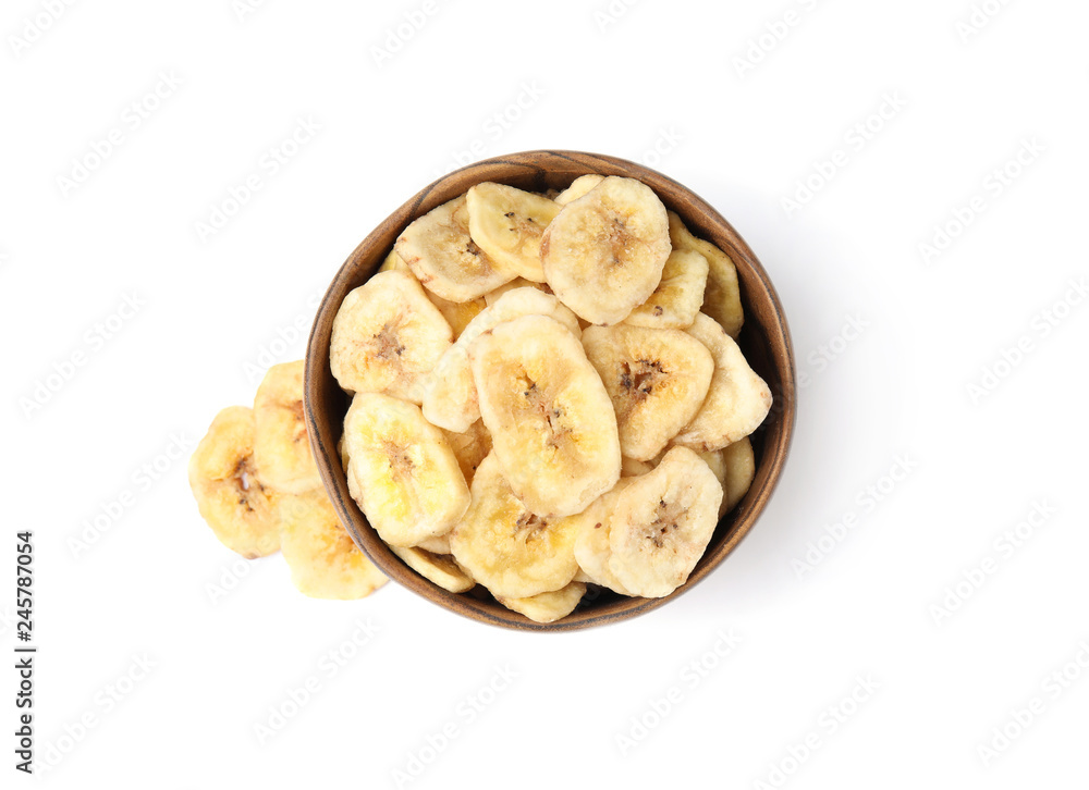 Wooden bowl with sweet banana slices on white background, top view. Dried fruit as healthy snack