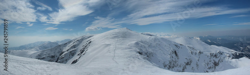 Panorama of High Tatras winter above the clouds