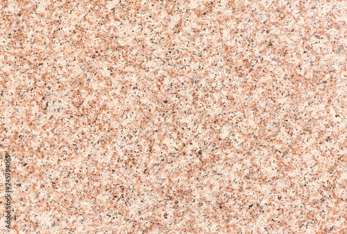 High resolution full frame background of a smooth light red granite stone floor tile.