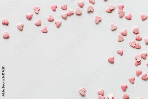 Valentine day background with pink hearts. Top view