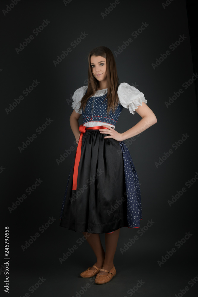 Young beautiful slovak woman in traditional costume 