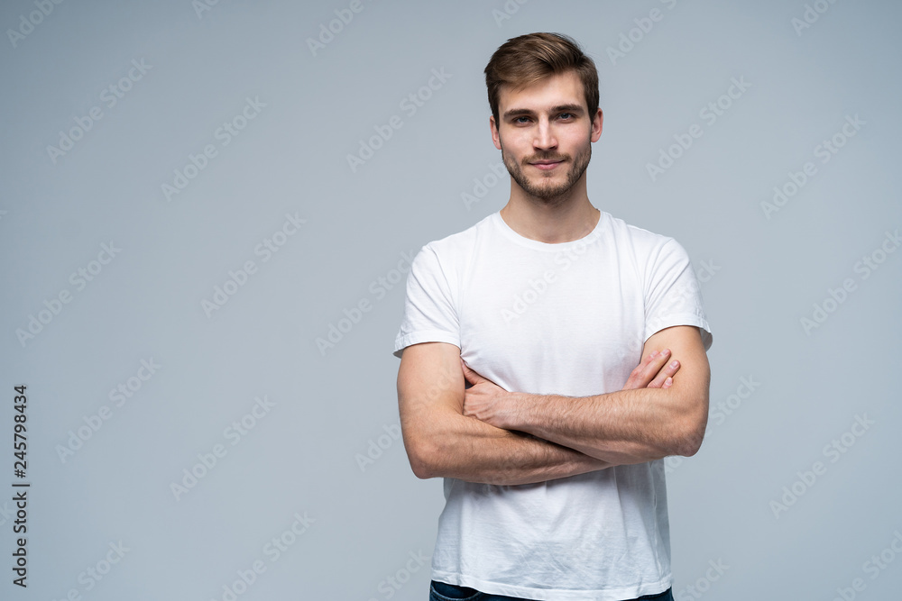 Handsome young guy posing in studio - isolated Handsome young guy posing in studio - isolated
