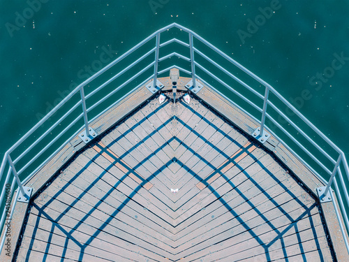 Canvas Print wooden dock with railing by the water in stockholm