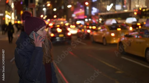 Wallpaper Mural Young woman with her cell phone in the streets of New York Torontodigital.ca
