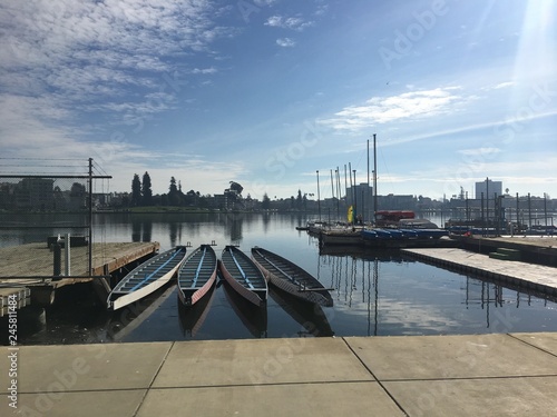 docked boats on lake