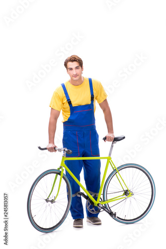 Man repairing his bike isolated on white background