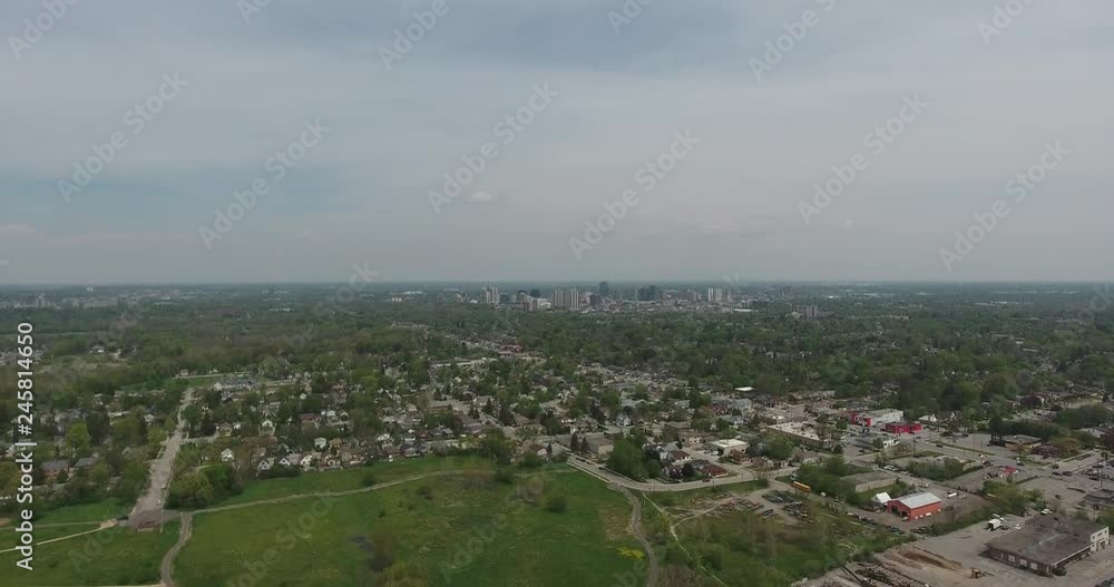 Flying Over Poor Neighborhood Towards City Center